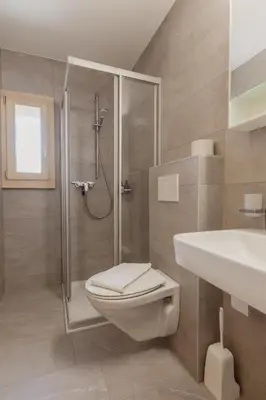 Ein Badezimmer in der Unterkunft Studio rénové à Grimentz