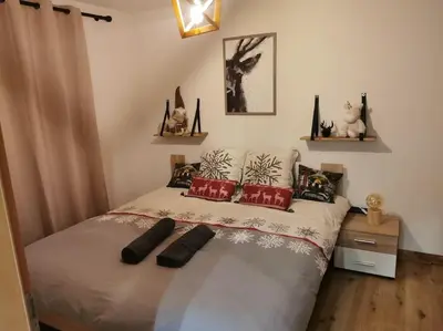 Ein Bett oder Betten in einem Zimmer der Unterkunft Charmant appartement balcon et parking