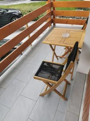 Ein Balkon oder eine Terrasse in der Unterkunft Charmant appartement balcon et parking