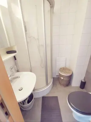 Ein Badezimmer in der Unterkunft Charmant appartement balcon et parking