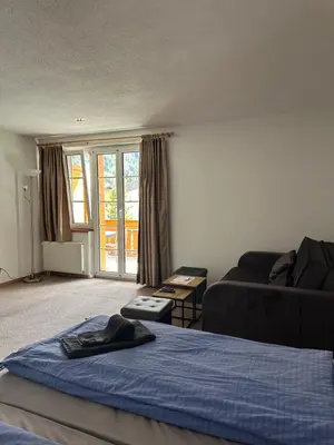 Ein Bett oder Betten in einem Zimmer der Unterkunft Touristenheim Bergfreude