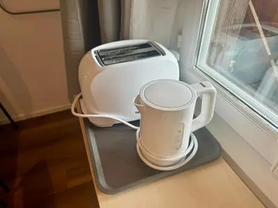 Kaffee-/Teezubehör in der Unterkunft Chalet Studio Apartment with Aircon