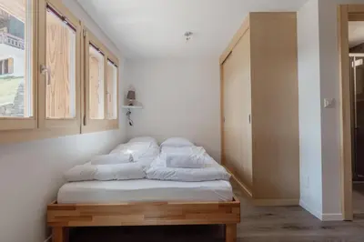 Ein Bett oder Betten in einem Zimmer der Unterkunft Charmant studio rénové à Grimentz