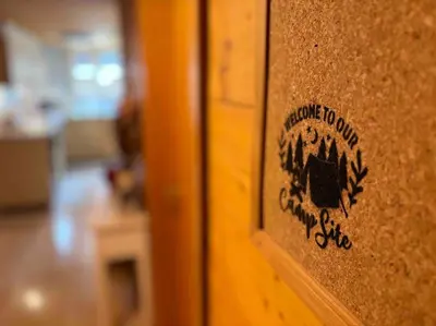 Ein Zertifikat, Auszeichnung, Logo oder anderes Dokument, das in der Unterkunft Appartement Cosy - Chalet Central ausgestellt ist