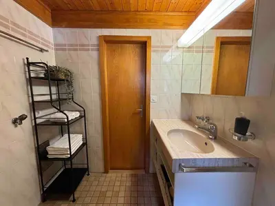 Ein Badezimmer in der Unterkunft Appartement Cosy - Chalet Central