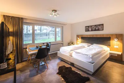 Ein Bett oder Betten in einem Zimmer der Unterkunft Haus Granit, 2 rooms, ground floor