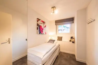 Ein Bett oder Betten in einem Zimmer der Unterkunft Haus Granit, 2 rooms, ground floor