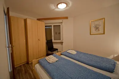 Ein Bett oder Betten in einem Zimmer der Unterkunft Haus Bodmen C, Apartment Anemone