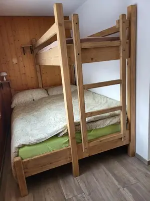 Ein Bett oder Betten in einem Zimmer der Unterkunft Appartement 3 pièces à Anzère