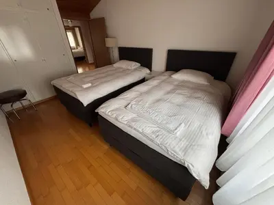 Ein Bett oder Betten in einem Zimmer der Unterkunft Garden Park Apartment