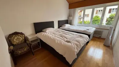 Ein Bett oder Betten in einem Zimmer der Unterkunft Garden Park Apartment