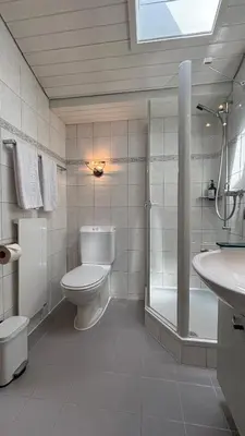Ein Badezimmer in der Unterkunft Garden Park Apartment
