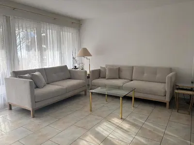 Ein Sitzbereich in der Unterkunft Garden Park Apartment