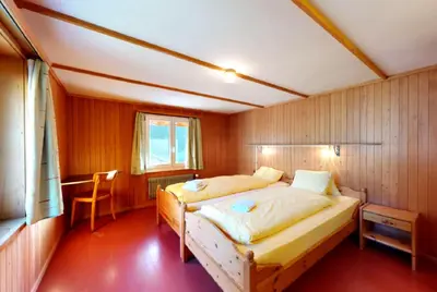 Ein Bett oder Betten in einem Zimmer der Unterkunft Gadmen Alpenrose, Switzerland