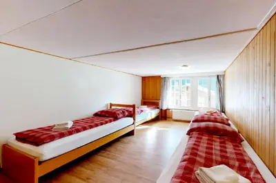 Ein Bett oder Betten in einem Zimmer der Unterkunft Gadmen Alpenrose, Switzerland