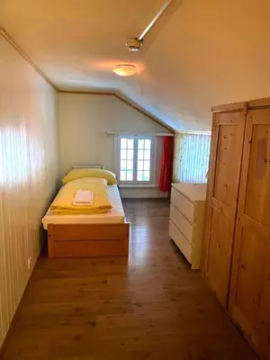 Ein Bett oder Betten in einem Zimmer der Unterkunft Gadmen Alpenrose, Switzerland