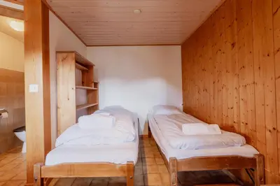 Ein Bett oder Betten in einem Zimmer der Unterkunft Studio avec vue sur les montagnes