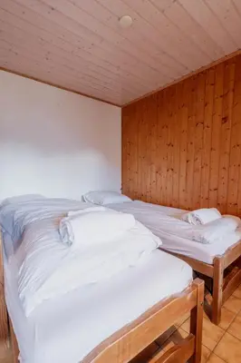 Ein Bett oder Betten in einem Zimmer der Unterkunft Studio avec vue sur les montagnes