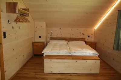 Ein Bett oder Betten in einem Zimmer der Unterkunft Chalet Männertreu OG