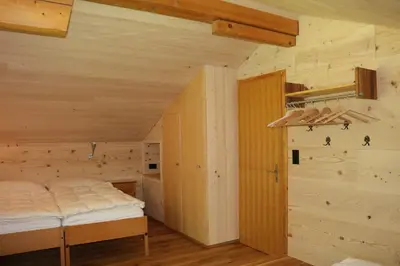 Ein Bett oder Betten in einem Zimmer der Unterkunft Chalet Männertreu OG