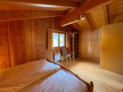 Ein Bett oder Betten in einem Zimmer der Unterkunft Chalet Siesta OG
