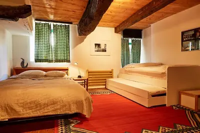 Ein Bett oder Betten in einem Zimmer der Unterkunft Wild Valley Rustico Esclusivo in Valle Onsernone
