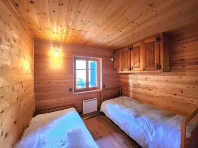 Ein Bett oder Betten in einem Zimmer der Unterkunft Chalet Pololo avec sauna, Val d'Hérens