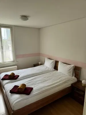 Ein Bett oder Betten in einem Zimmer der Unterkunft Garden House