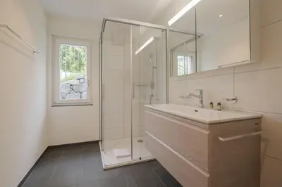 Ein Badezimmer in der Unterkunft Chalet Eigerlicht