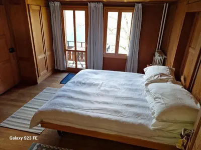Ein Bett oder Betten in einem Zimmer der Unterkunft Traditional chalet in Wengen - Parterre or Ground