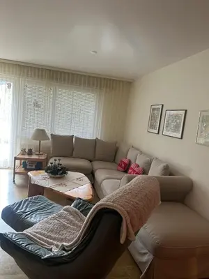 Ein Sitzbereich in der Unterkunft Appartement avec grande terrasse Loèche les Bains