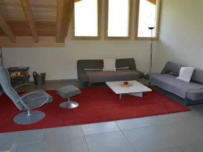 Ein Sitzbereich in der Unterkunft Apartment Alpha by Interhome
