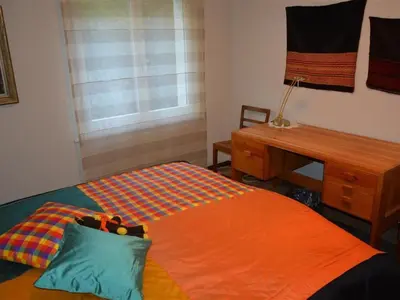 Ein Bett oder Betten in einem Zimmer der Unterkunft Apartment Hübeli - Arm by Interhome