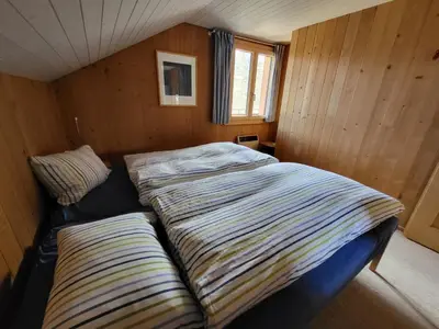 Ein Bett oder Betten in einem Zimmer der Unterkunft Apartment Wildbach by Interhome