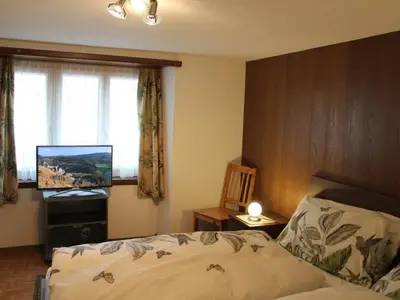 Ein Bett oder Betten in einem Zimmer der Unterkunft Apartment Alpentraum by Interhome