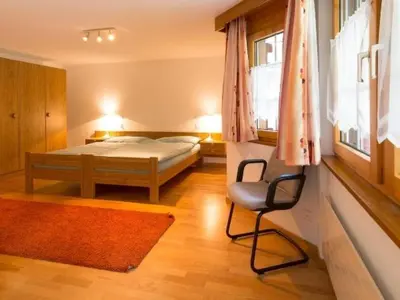 Ein Bett oder Betten in einem Zimmer der Unterkunft Apartment Haus Evita by Interhome