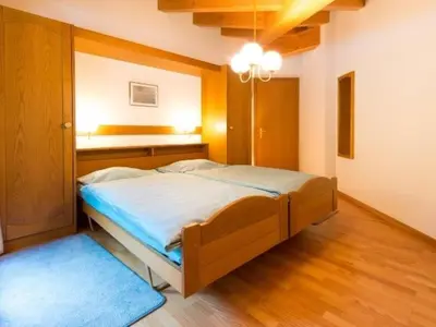 Ein Bett oder Betten in einem Zimmer der Unterkunft Apartment Haus Evita by Interhome