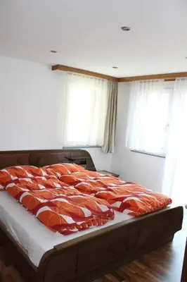 Ein Bett oder Betten in einem Zimmer der Unterkunft Apartment Weideli by Interhome