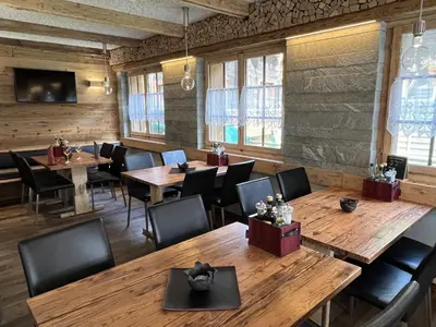 Ein Restaurant oder anderes Speiselokal in der Unterkunft Apartment Channa by Interhome