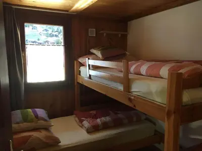 Ein Bett oder Betten in einem Zimmer der Unterkunft Apartment Almenrausch 2- OG Süd-West by Interhome