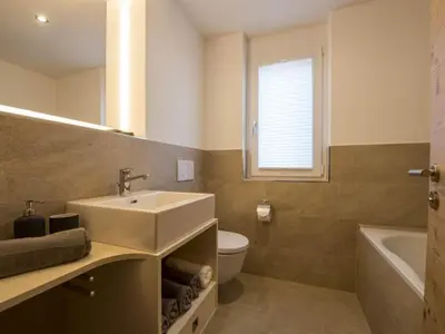 Ein Badezimmer in der Unterkunft Apartment Huwetz EG Süd by Interhome