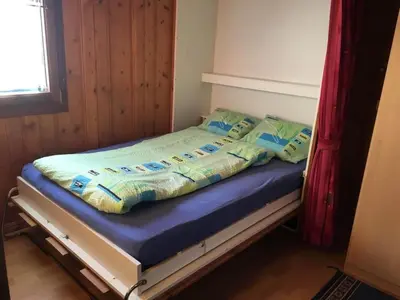 Ein Bett oder Betten in einem Zimmer der Unterkunft Apartment Almenrausch 2- OG Süd-Ost by Interhome