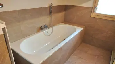 Ein Badezimmer in der Unterkunft 5-Zimmerwohnung Zentral und nahe den Skipisten