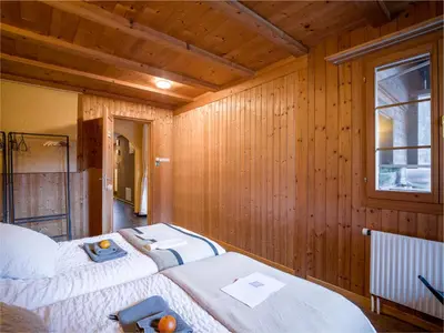 Ein Bett oder Betten in einem Zimmer der Unterkunft Gästehaus Milital