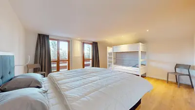 Ein Bett oder Betten in einem Zimmer der Unterkunft Chalet de l Ours