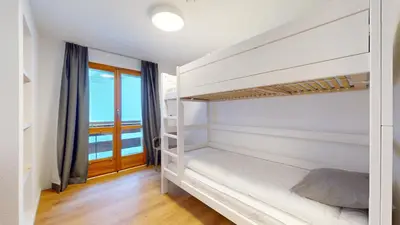 Ein Bett oder Betten in einem Zimmer der Unterkunft Chalet de l Ours AUTHENTIC Etage Tournay 12 pers