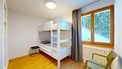 Ein Bett oder Betten in einem Zimmer der Unterkunft Chalet de l Ours AUTHENTIC Etage Valerie 12 pers
