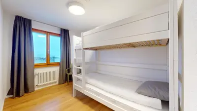 Ein Bett oder Betten in einem Zimmer der Unterkunft Chalet de l Ours AUTHENTIC Etage Valerie 12 pers