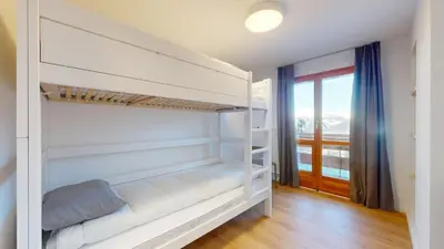 Ein Bett oder Betten in einem Zimmer der Unterkunft Chalet de l Ours AUTHENTIC Etage Fontaine 14 pers