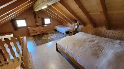 Ein Bett oder Betten in einem Zimmer der Unterkunft Chalet Bergtraum